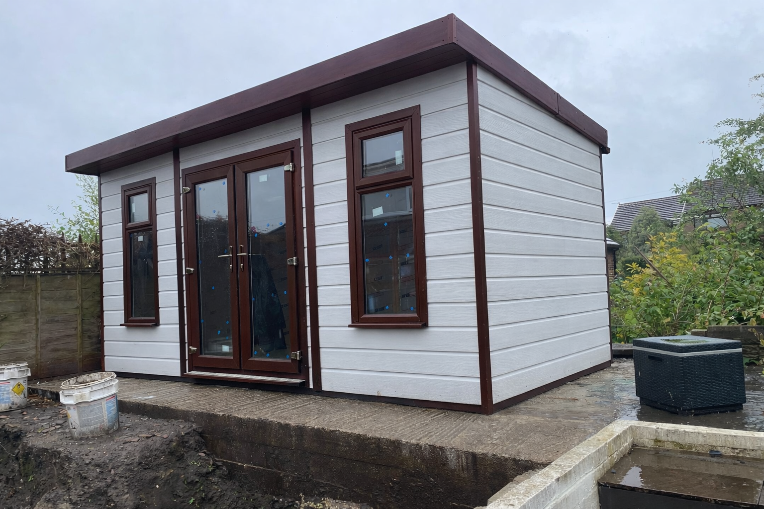 Rosewood uPVC colour option for light grey composite cladded garden rooms | Shed King